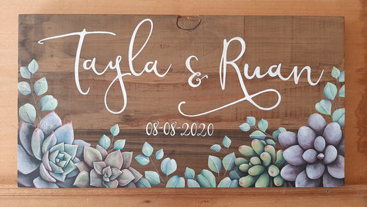 Can't lock down love: Hand-painted succulent wedding name board