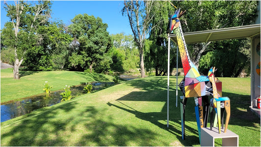 From scrap to stunning: A herd of giraffes crafted from wood